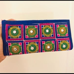 Colorful hand embroidered clutch